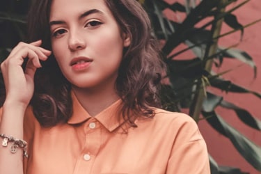 model with orange shirt